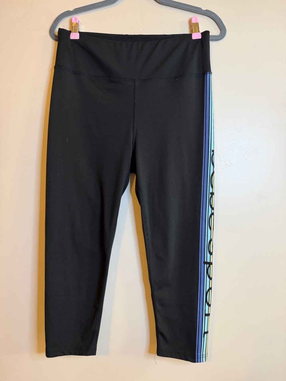 bebe Black Capri Leggings with Blue and Light Green Side Stripe